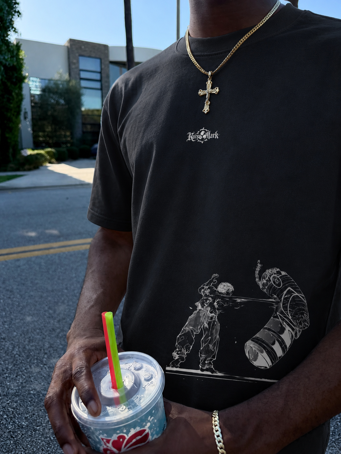 Baki Hanma Kurse Mark Tee by PODpartner showing a black graphic T-shirt with Baki Hanma design on the front