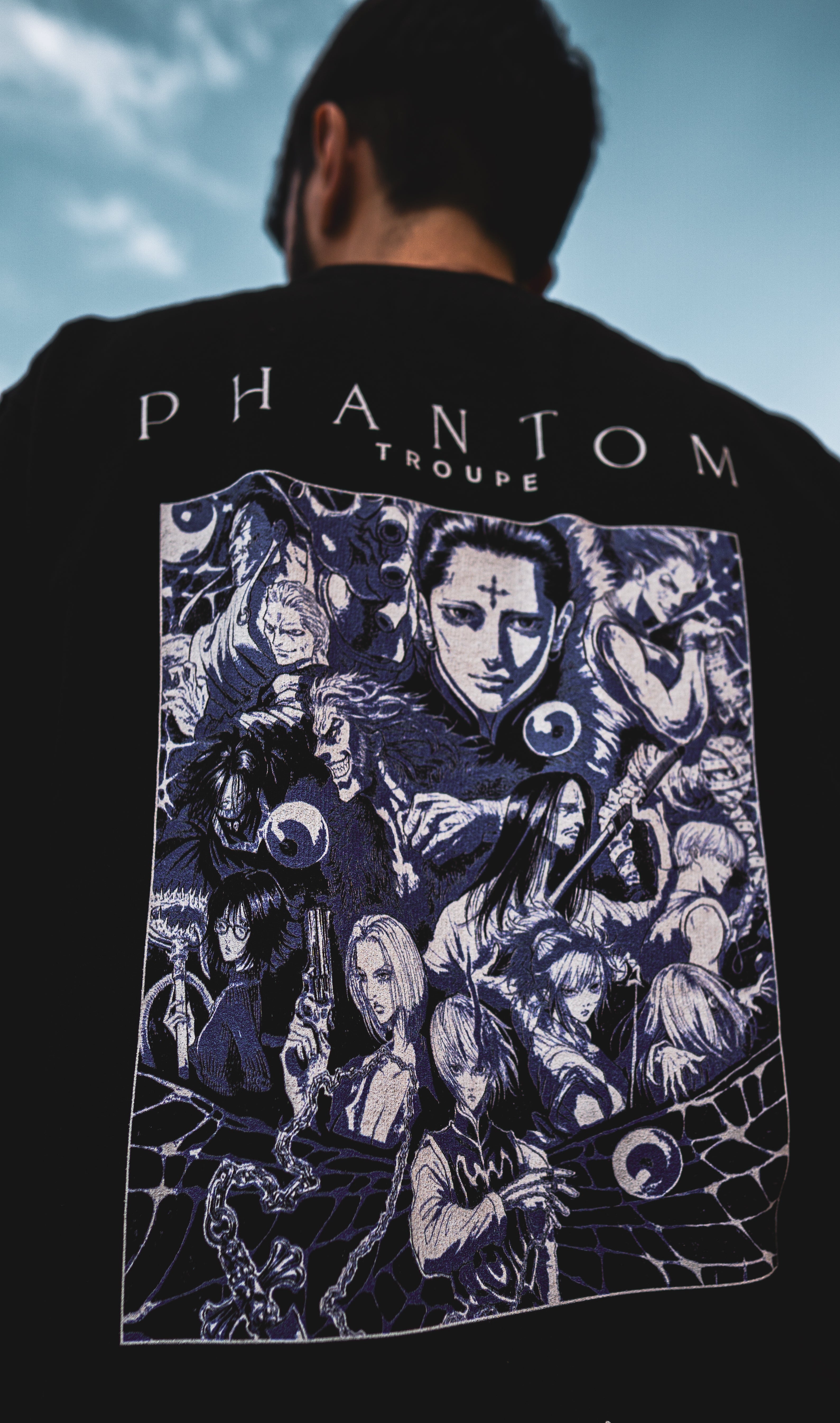 PODpartner Phantom Troupe Kurse Mark Tee featuring a graphic print of Kurse from the Phantom Troupe on a casual t-shirt.