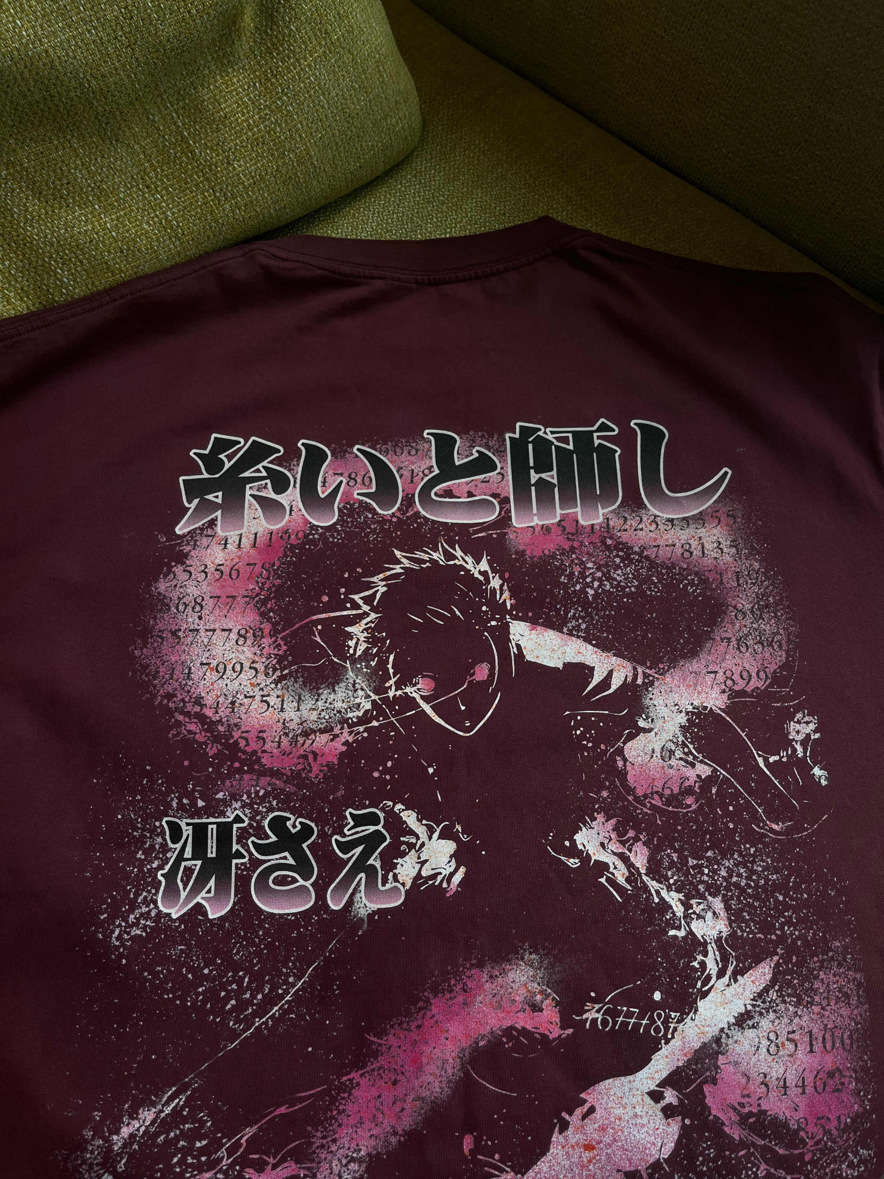 Itoshi Sae's Ego Kurse Mark oversized tee in black, showing a relaxed fit with graphic design on the front.
