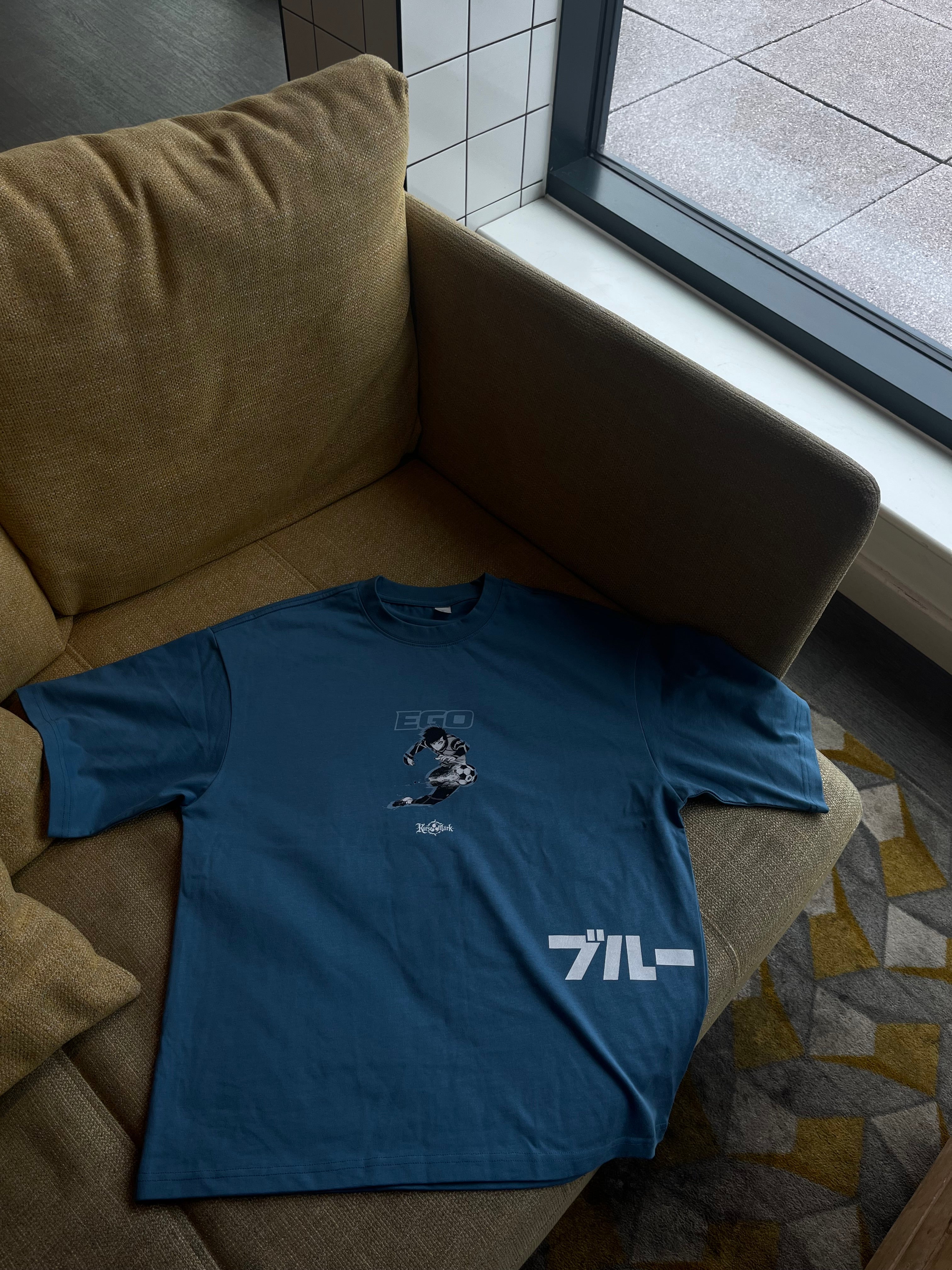 Kurse Mark Rin's Ego Kurse Mark Tee, a casual men's t-shirt with logo design, in black fabric, front view.