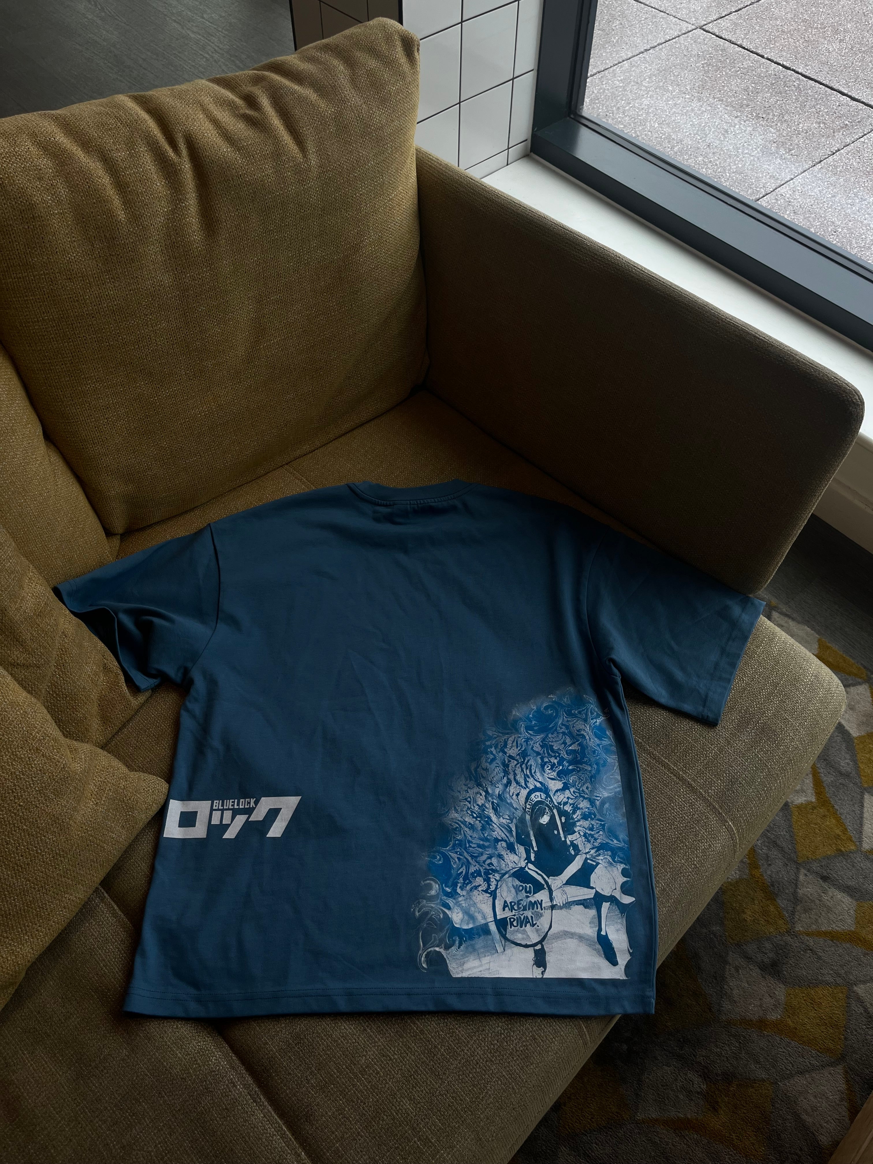 Rin's Ego Kurse Mark Tee featuring a casual fit and graphic design, made by Kurse Mark, displayed on a plain background.