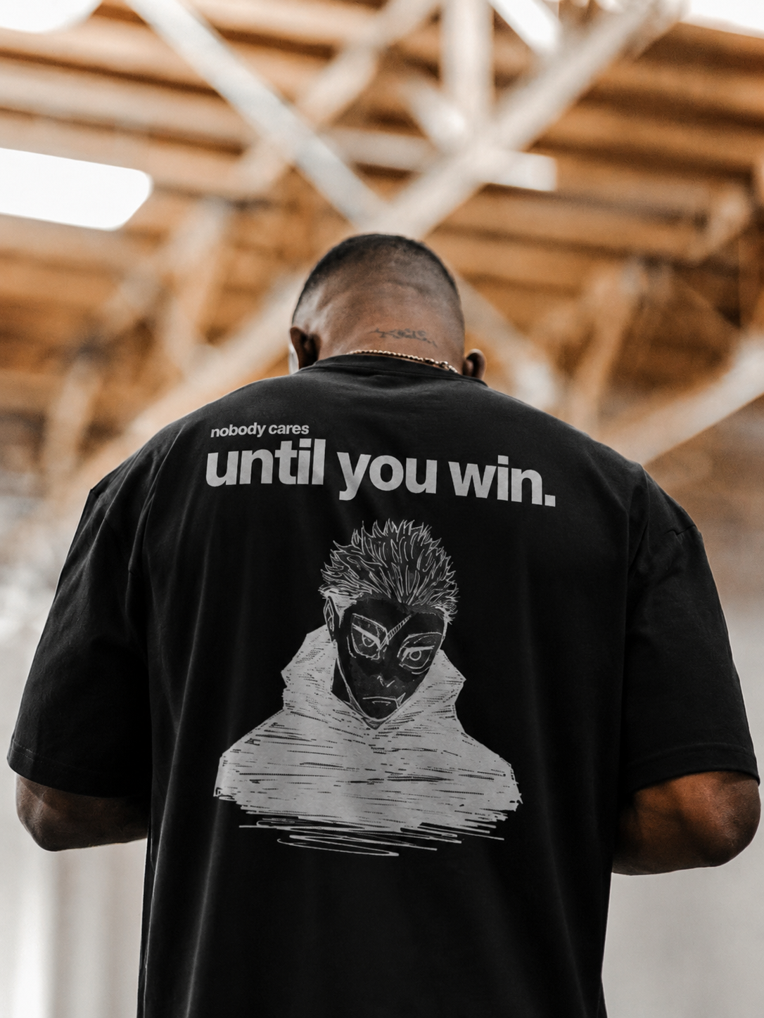 Yellow PODpartner Yuji's Ego Kurse Mark Tee featuring a bold graphic design on soft cotton fabric.